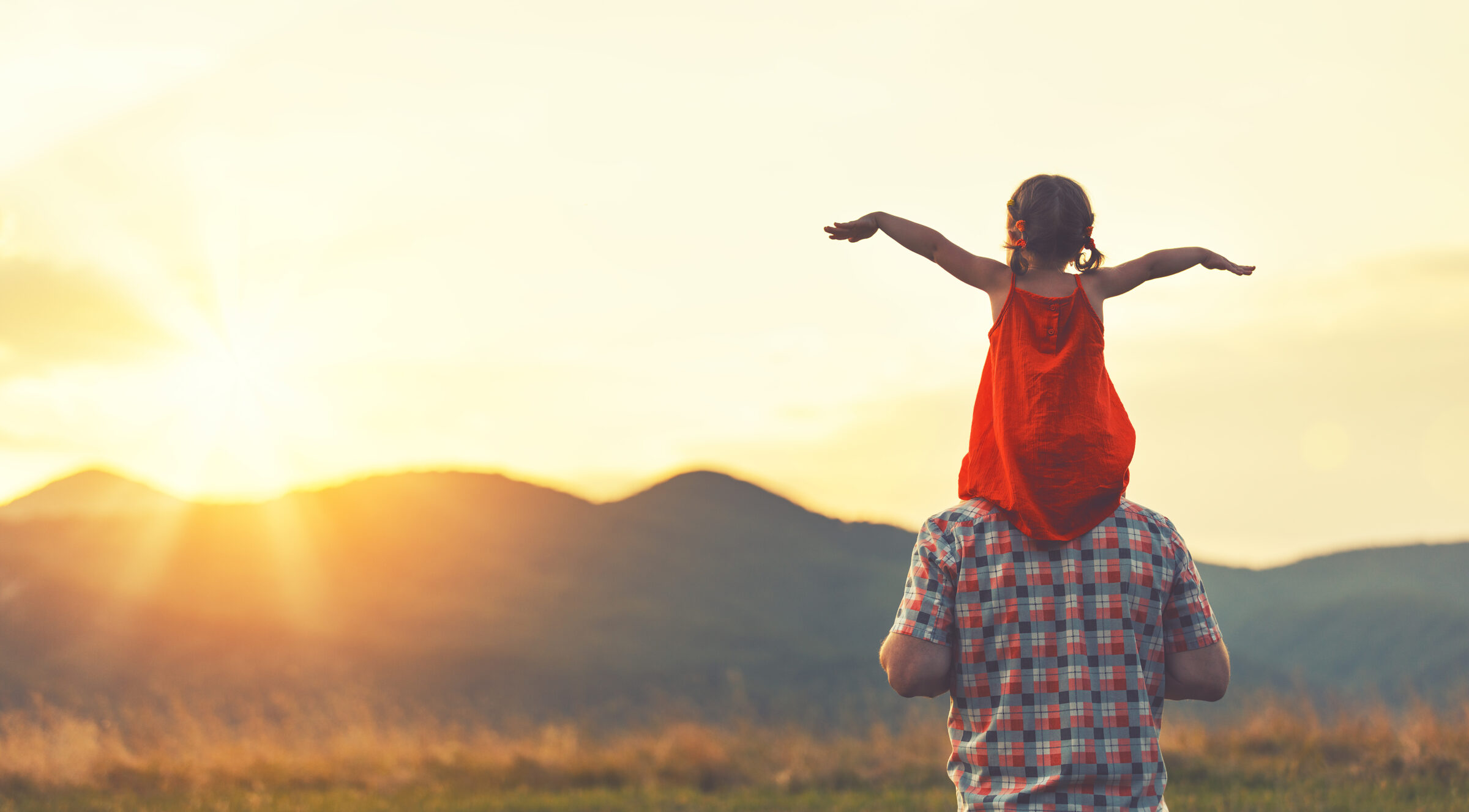 concept of family. father and child daughter outdoors