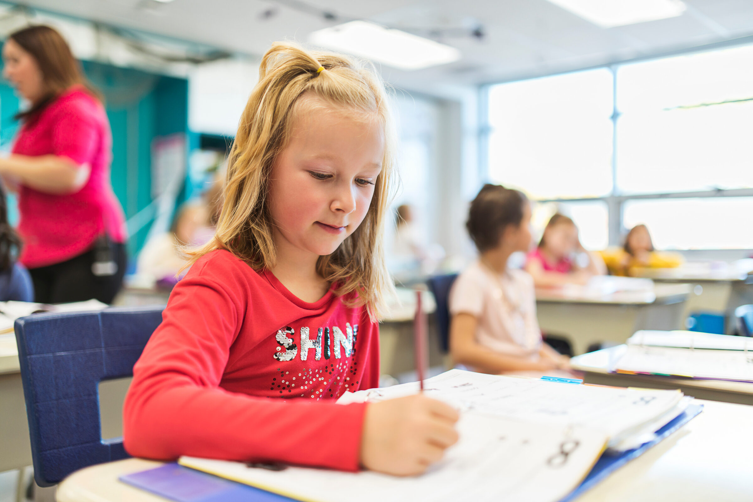 education and school concept little student girl studying at school